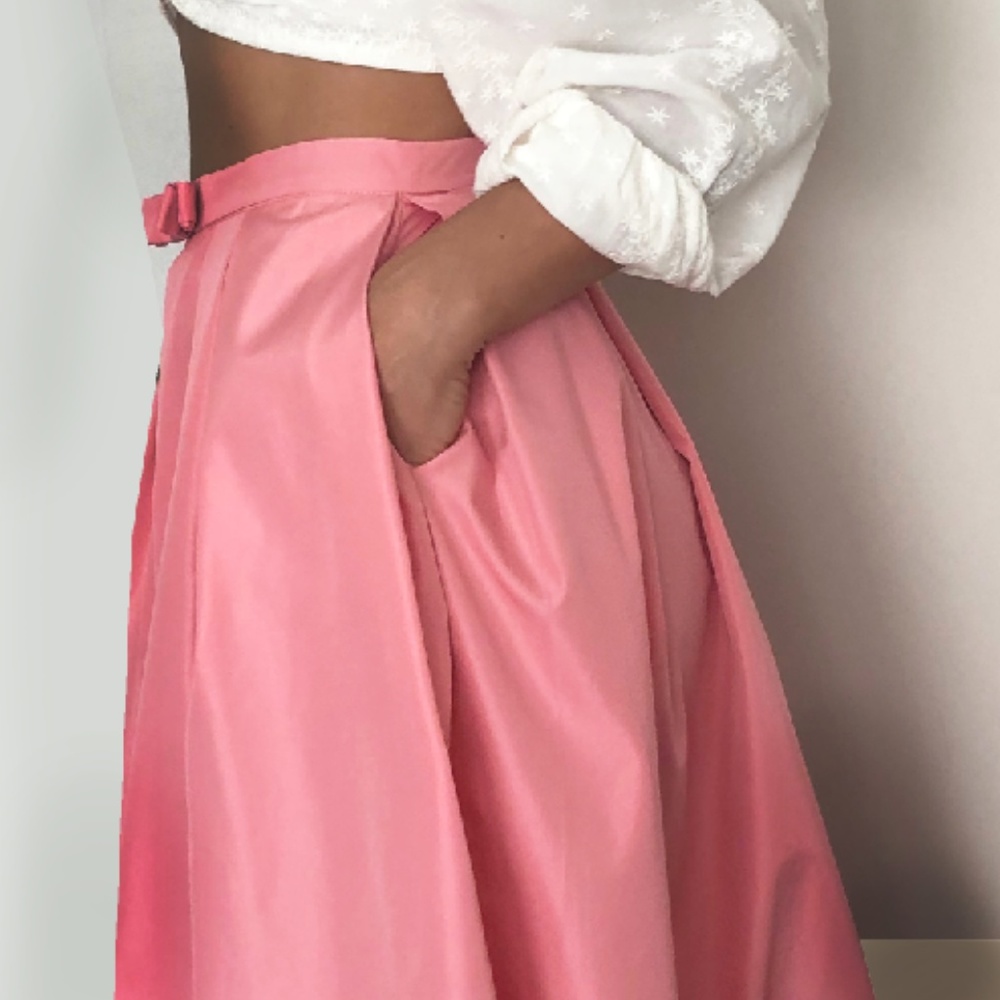 Pink skirt with pockets bow detail pleated party